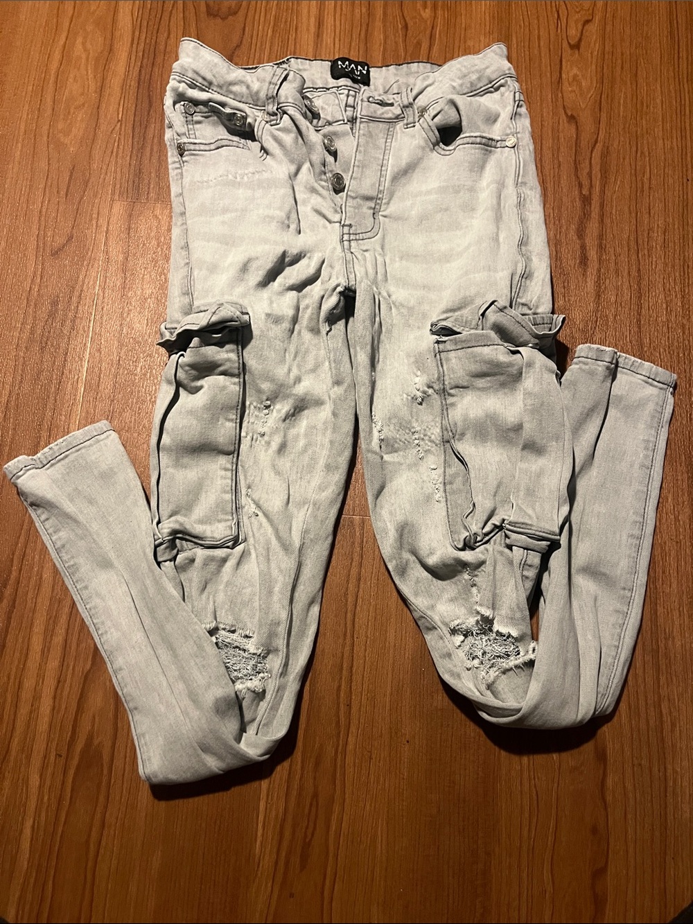 3/$15. Men’s distressed stretch jeans XS